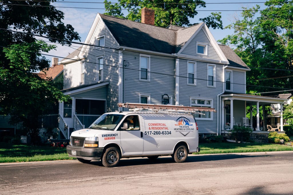 Tri-State Heating and Cooling service van on an emergency AC repair call